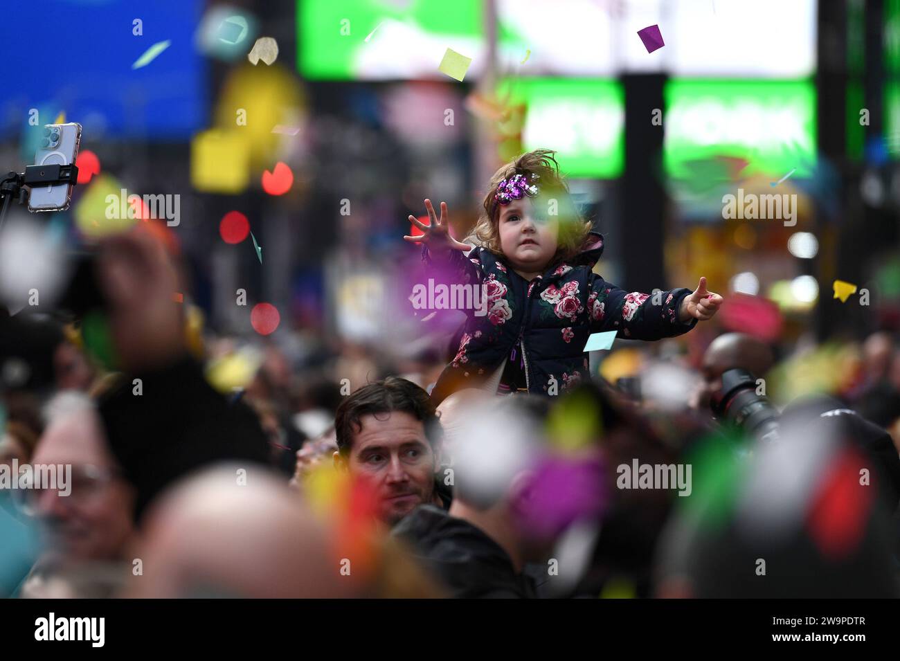 New York, USA. 29th Dec, 2023. Cassidy, 4, reaches for floating