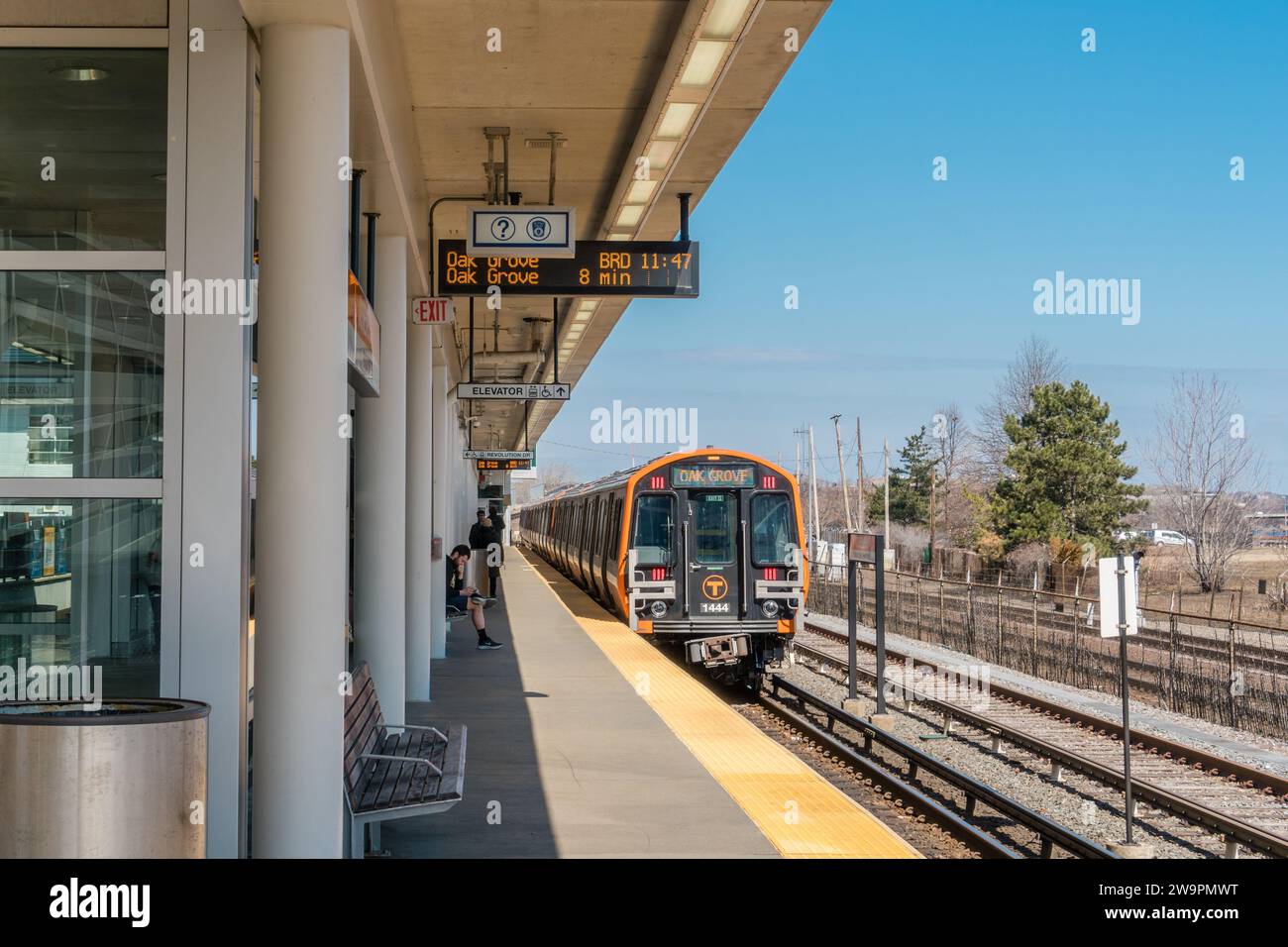 Boston, Massachusetts, USA -March 21, 2023 : Orange Line train stopped at Assembly Square Station is a rapid transit station in Somerville, Massachuse Stock Photo