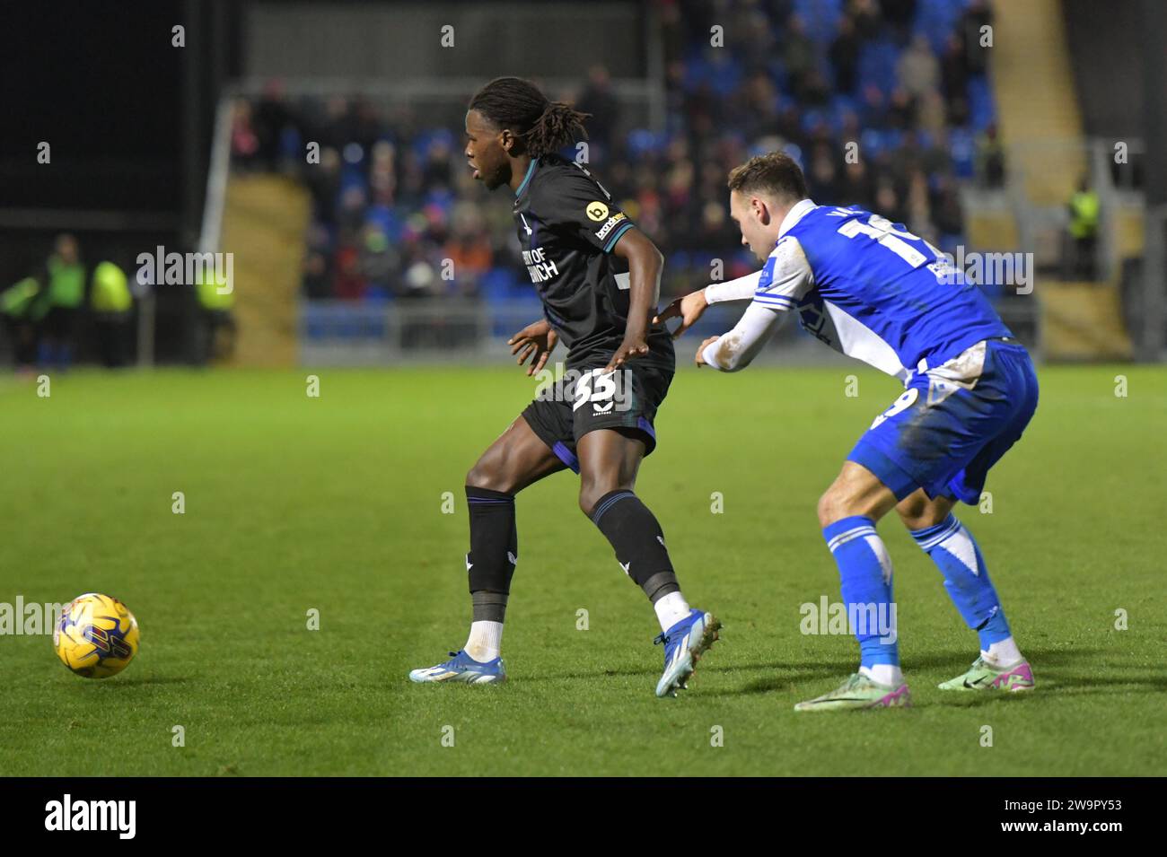 Bristol, England. 29th Dec 2023. Karoy Anderson of Charlton Athletic protects the ball from Harvey Vale of Bristol Rovers during the Sky Bet EFL League One match Bristol Rovers and Charlton Athletic. Kyle Andrews/Alamy Live News Stock Photo