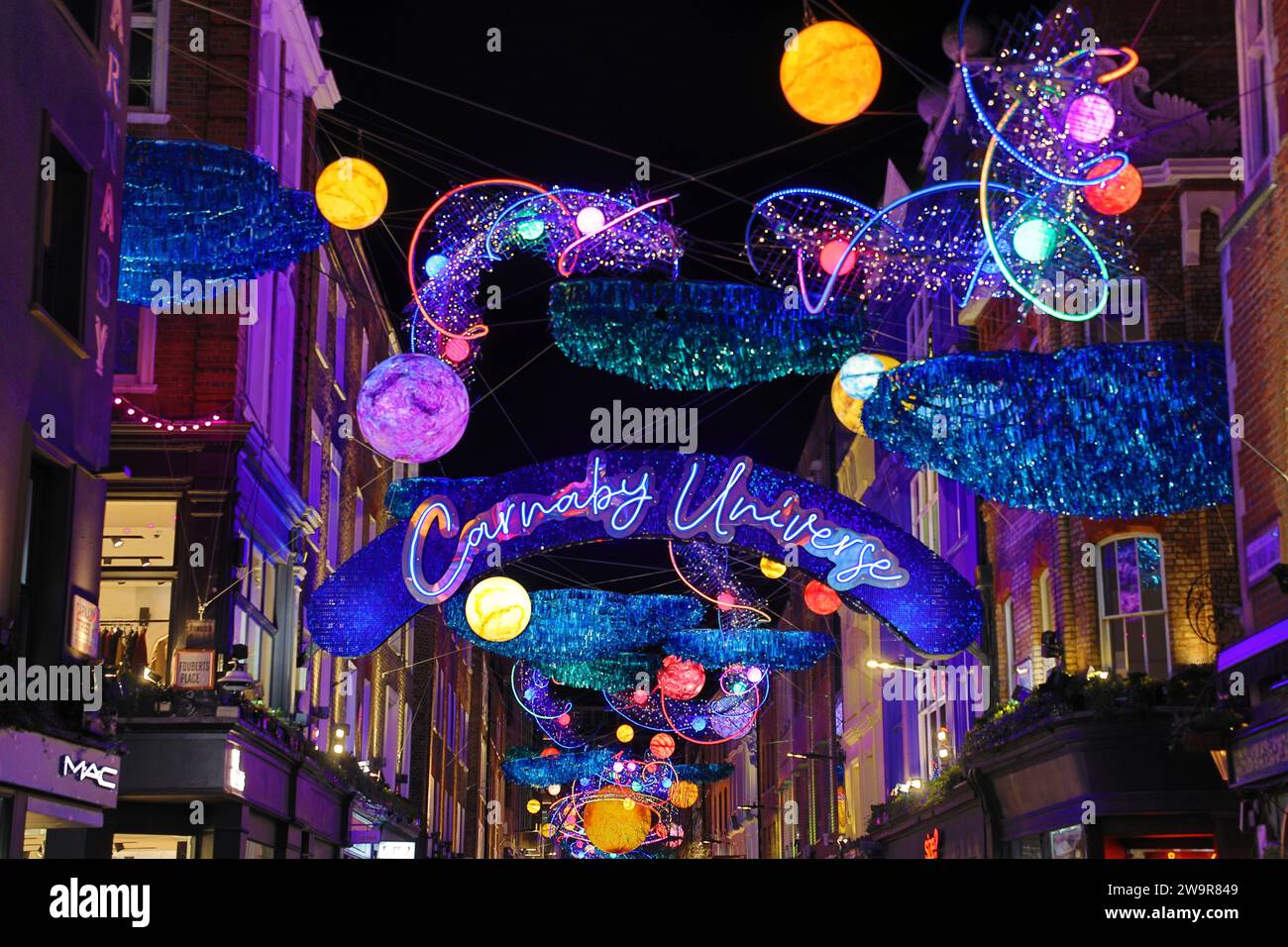 Christmas lights in Carnaby Street in London 2023 with a space theme called Carnaby Universe