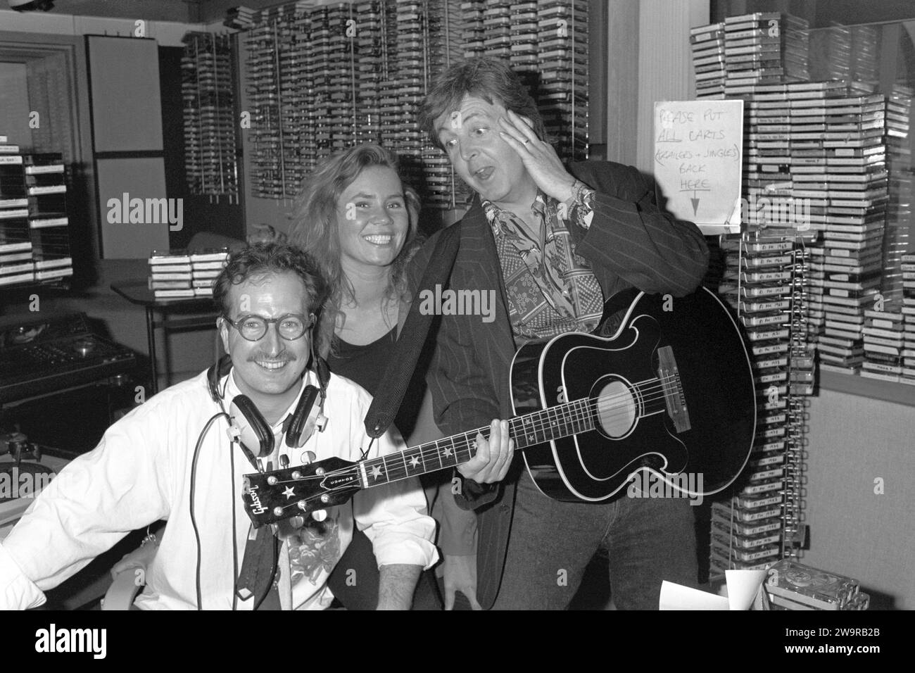 File photo dated 13/06/90 of Paul McCartney surprising Radio 1 DJ Steve Wright and his production assistant Dianne Oxberry. Steve Wright has been made an MBE (Member of the Order of the British Empire) in the New Year Honours list, for services to radio. Issue date: Friday December 29, 2023. Issue date: Friday December 29, 2023. Stock Photo