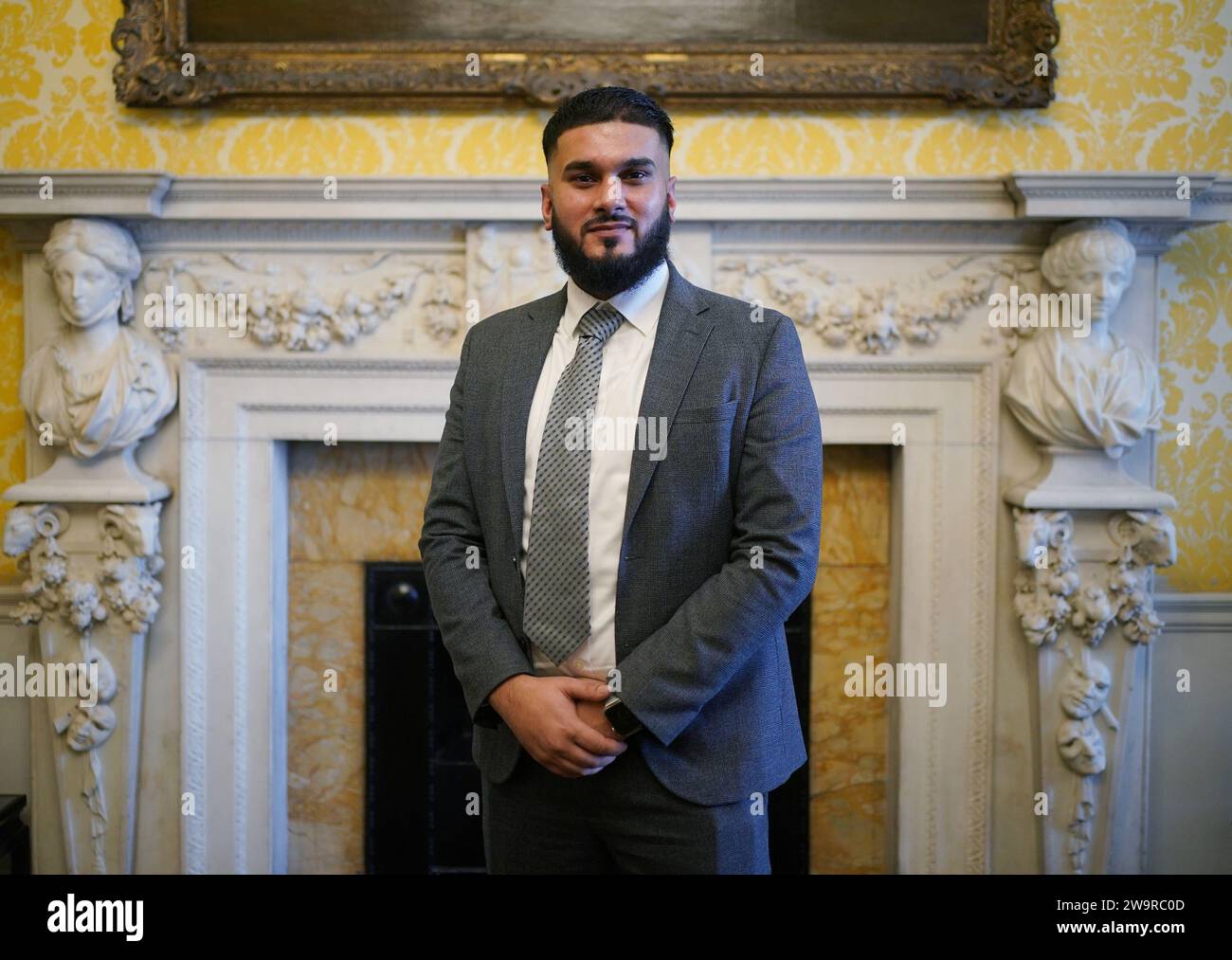 Rizwan Javed, who has been awarded an MBE (Member of the Order of the British Empire) in the New Year Honours list, during a press briefing at Admiralty House in London. The Station Assistant for the MTR Elizabeth Line has assisted 29 people who were at risk of ending their lives at the railway, and received 29 suicide intervention commendations and numerous other awards in recognition of this work. The honour recognises services to vulnerable people. Picture date: Thursday December 28, 2023. Stock Photo