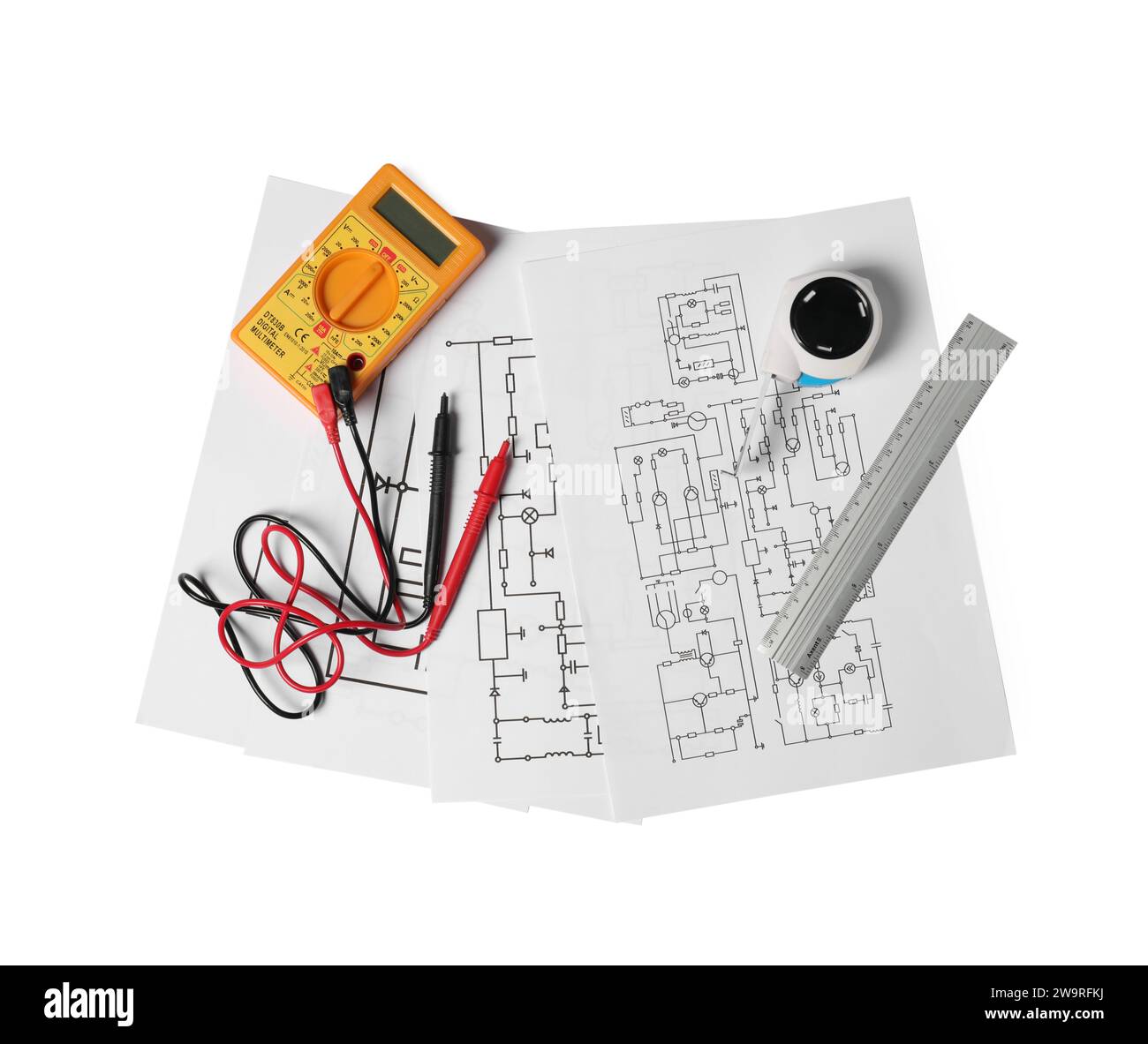 Wiring diagrams, digital multimeter, tape measure and ruler isolated on