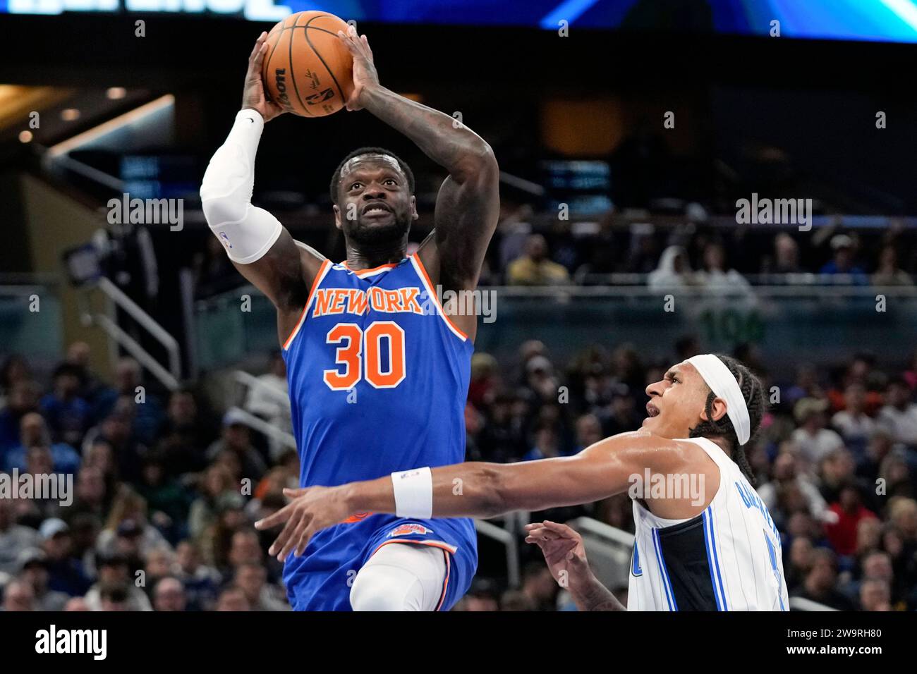 New York Knicks Forward Julius Randle (30) Looks To Shoot Over Orlando 