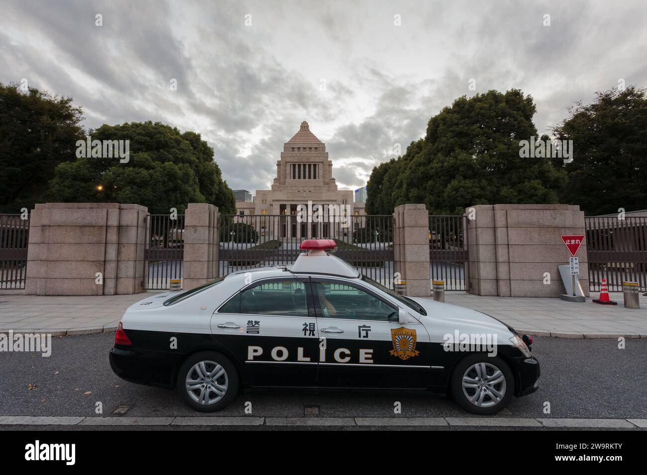 A police patrol car outside the Japanese Government (Diet) building in Tokyo, Japan Stock Photo