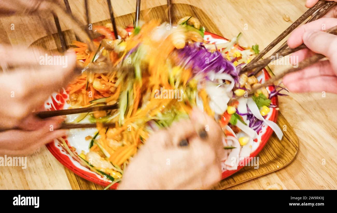 chinese new year tossing fish