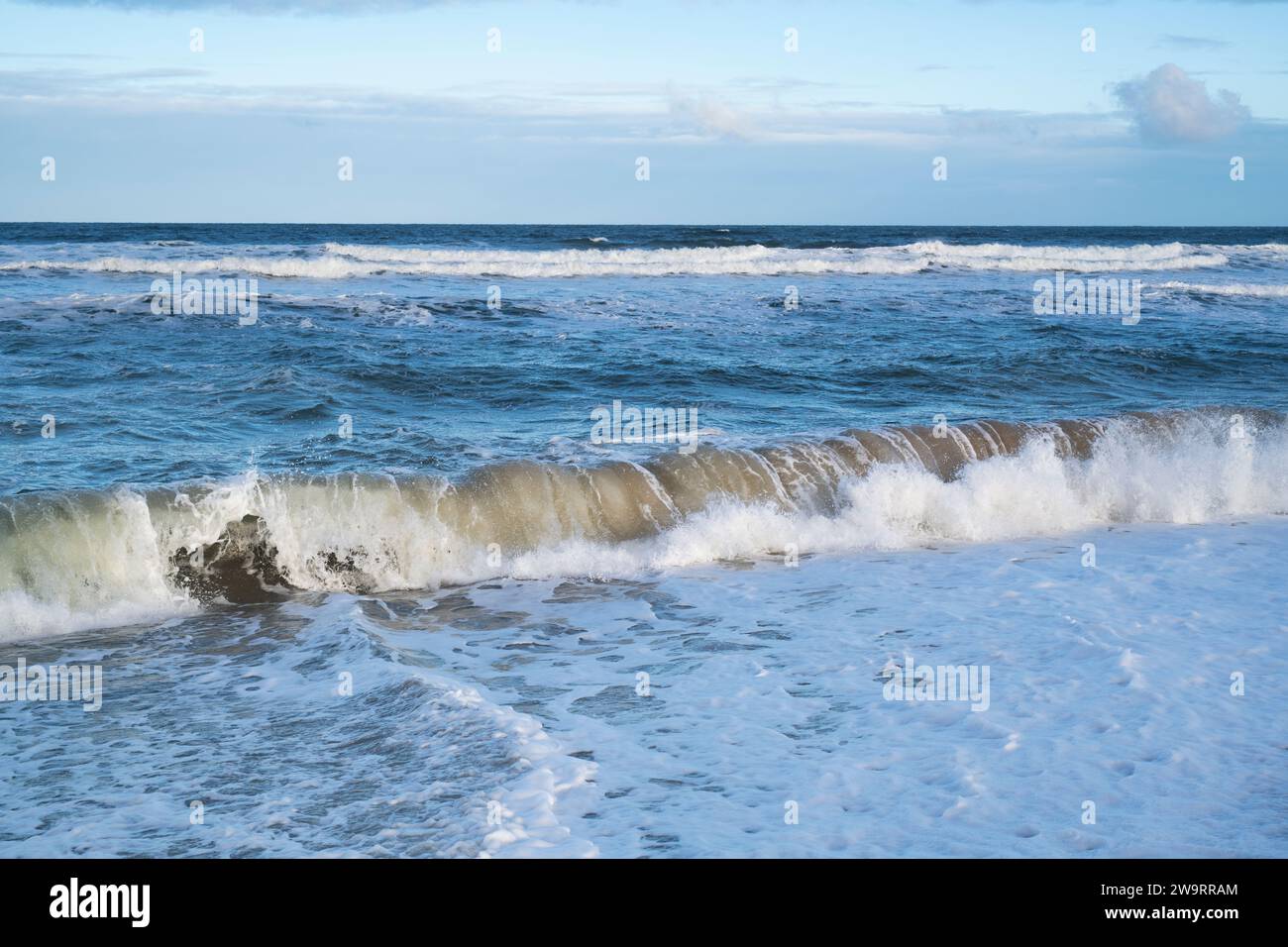 Waves in the sea on a windy Findhorn beach. Findhorn, Morayshire, Scotland Stock Photo