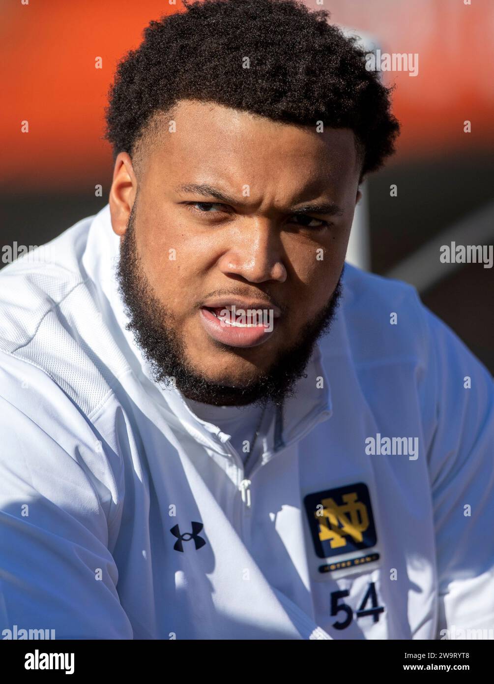 Notre Dame offensive lineman Blake Fisher watches the warmups of the
