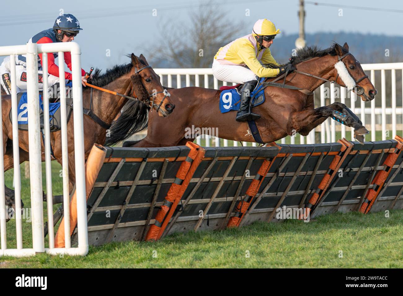 Catchin Time, ridden by Peter Summers and trained by Laura Hurley, running in the handicap hurdle at Wincanton, March 21st 2022 Stock Photo