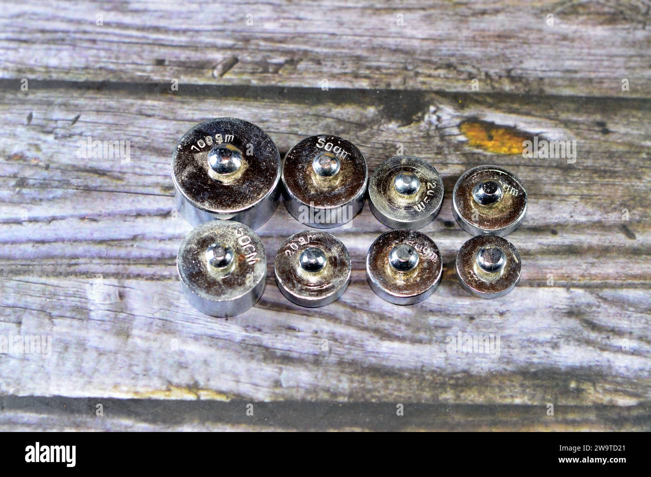 Laboratory weights and masses, used to calibrate scales or balances or