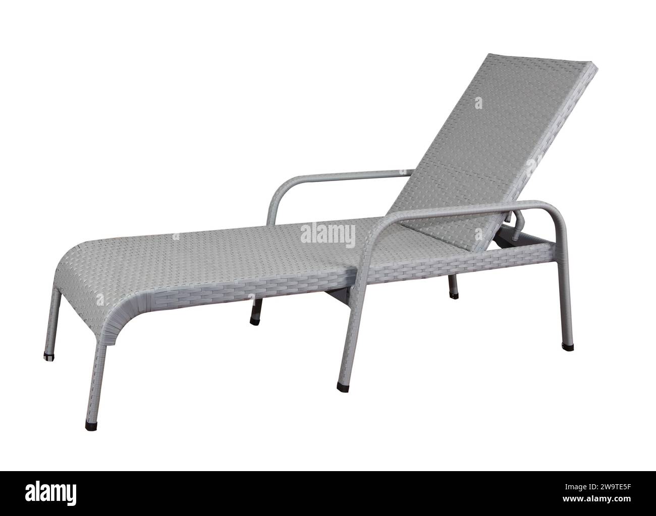 Rattan sun lounger. Wicker garden furniture isolated on white Stock