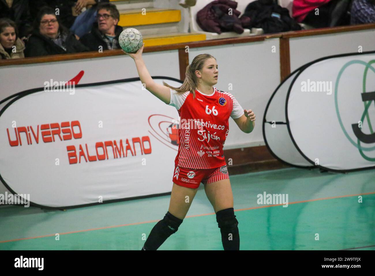 Gijon, Spain. 29th Dec, 2023. The player of Motive.co Gijon Balonmano La Calzada, Dorottya Margit Zentai (66) with the ball during the 13th matchday of the Liga Guerreras Iberdrola 2023-24 between Motive.co Gijon Balonmano La Calzada and the Mecalia Atletico Guardes, on December 29, 2023, at the La Arena Pavilion, in Gijon, Spain. (Photo by Alberto Brevers/Pacific Press) Credit: Pacific Press Media Production Corp./Alamy Live News Stock Photo