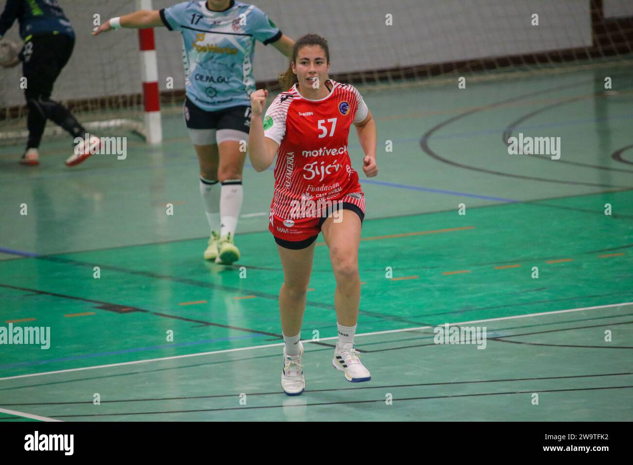 Gijon, Spain. 29th Dec, 2023. Motive.co Gijon Balonmano La Calzada's player, Rocio Rojas (57) celebrates a goal during the 13th matchday of the Liga Guerreras Iberdrola 2023-24 between Motive.co Gijon Balonmano La Calzada and the Mecalia Atletico Guardes, on December 29, 2023, at the La Arena Pavilion, in Gijon, Spain. (Photo by Alberto Brevers/Pacific Press) Credit: Pacific Press Media Production Corp./Alamy Live News Stock Photo