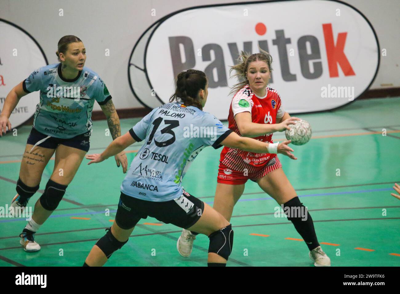 Gijon, Spain. 29th Dec, 2023. Motive.co Gijon Balonmano La Calzada player, Dorottya Margit Zentai (66, R) tries to get away from Maria Palomo (13, L) during the 13th matchday of the Liga Guerreras Iberdrola 2023- 24 between Motive.co Gijon Balonmano La Calzada and Mecalia Atletico Guardes, on December 29, 2023, at the La Arena Pavilion, in Gijon, Spain. (Photo by Alberto Brevers/Pacific Press) Credit: Pacific Press Media Production Corp./Alamy Live News Stock Photo