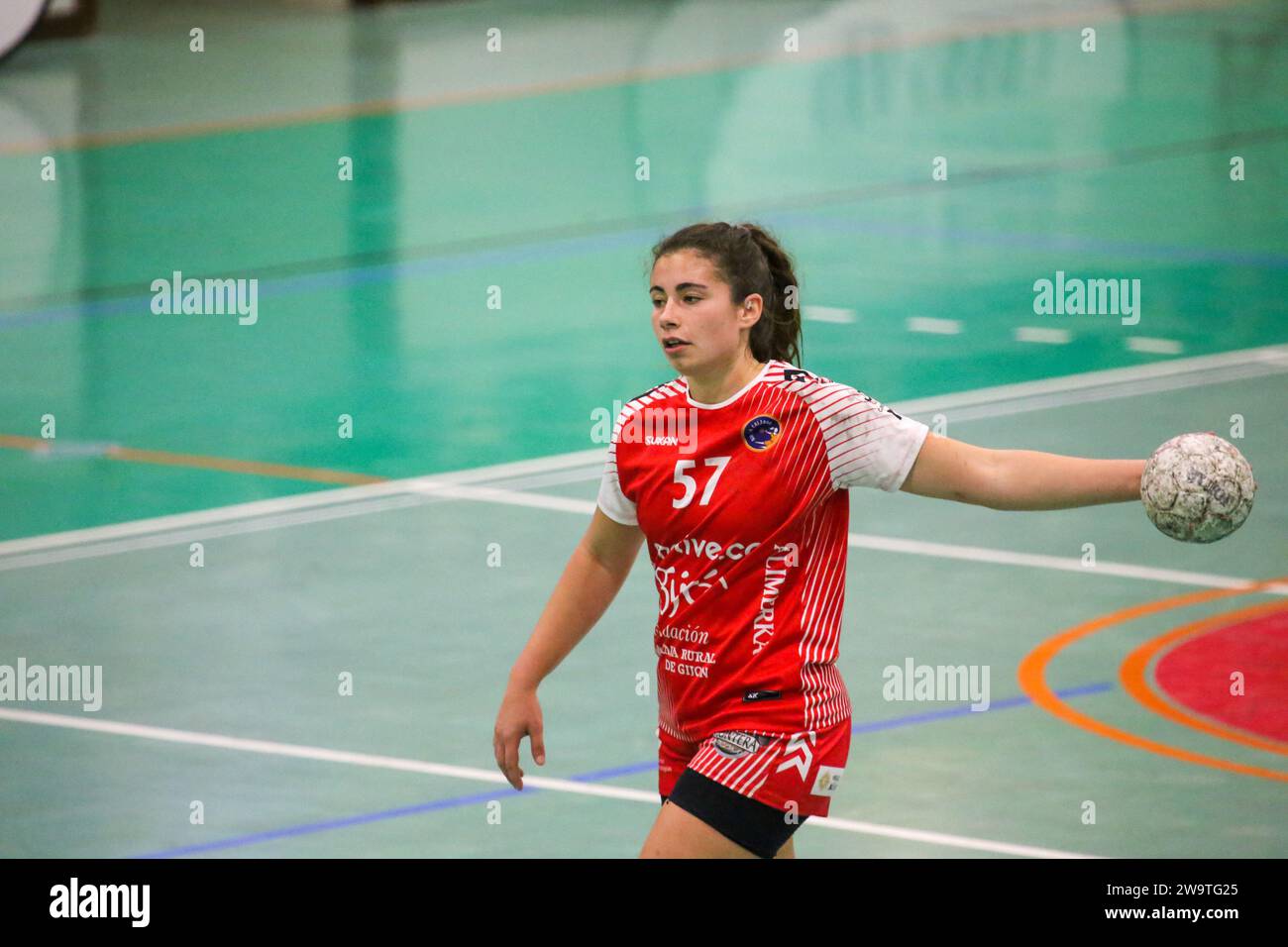 Gijon, Asturias, Spain. 29th Dec, 2023. Gijon, Spain, 29th December, 2023: The player of Motive.co Gijon Balonmano La Calzada, Rocio Rojas (57) with the ball during the 13th matchday of the Liga Guerreras Iberdrola 2023-24 between Motive.co Gijon Balonmano La Calzada and the Mecalia Atletico Guardes, on December 29, 2023, at the La Arena Pavilion, in Gijon, Spain. (Credit Image: © Alberto Brevers/Pacific Press via ZUMA Press Wire) EDITORIAL USAGE ONLY! Not for Commercial USAGE! Credit: ZUMA Press, Inc./Alamy Live News Stock Photo