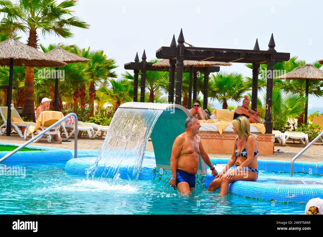 RIU Touareg hotel tourists in the waterfall, Jacuzzi, spa and swimming pool in Cape Verde Stock Photo