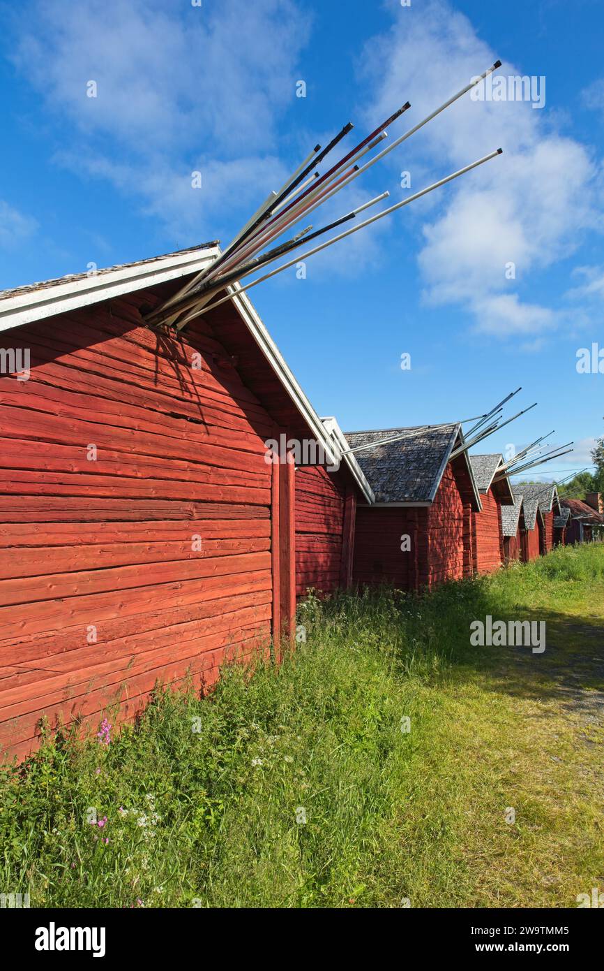 Old traditional red buildings in autumn, Kukkola, Lapland, Finland. Stock Photo
