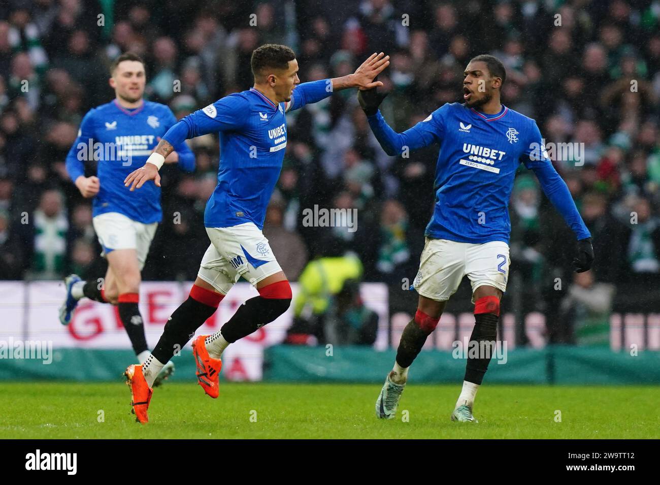 Rangers' James Tavernier (centre) celebrates scoring with Dujon