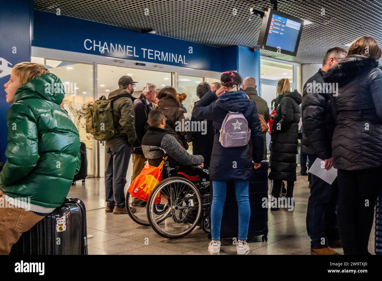 Brussels, Belgium. 30th Dec, 2023. People (some in wheelchairs) arrive