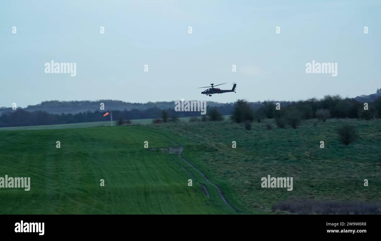 British Army Boeing Apache Attack Helicopter Ah64e Ah 64e In Flight Action Wilts Uk Stock British Army Boeing Apache Attack Helicopter Ah64e Ah 64e In Flight Action Wilts Uk Stock