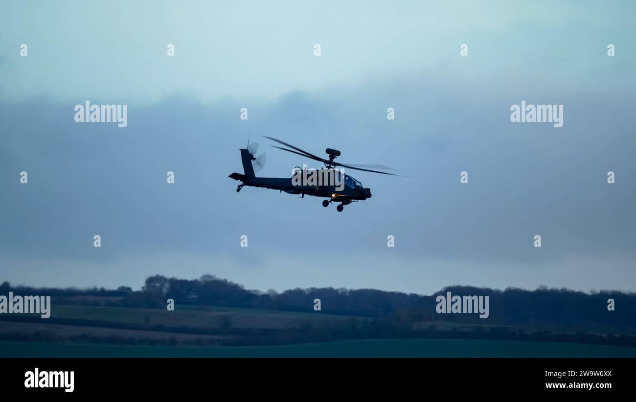 British Army Boeing Apache Attack Helicopter Ah64e Ah 64e In Flight Action Wilts Uk Stock British Army Boeing Apache Attack Helicopter Ah64e Ah 64e In Flight Action Wilts Uk Stock