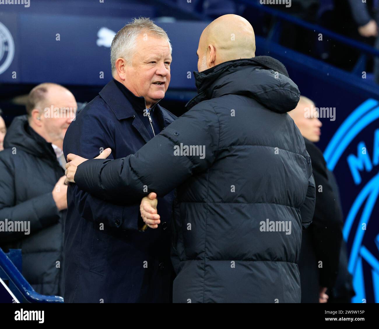 Manchester, UK. 30th Dec, 2023. The two managers Chris Wilder manager ...