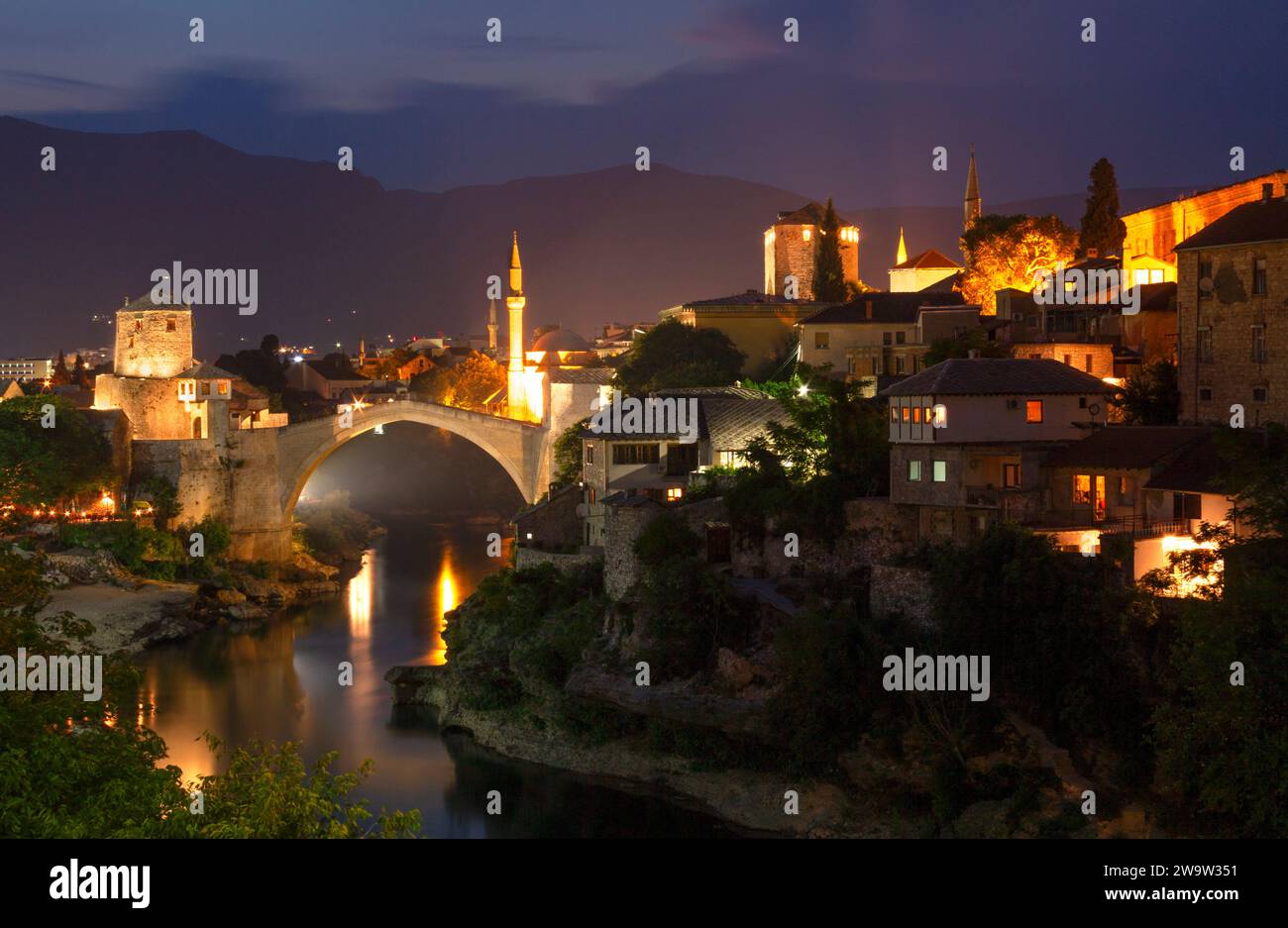 Stari Most Or Mostar Bridge Above The Neretva River And The Old Town In 