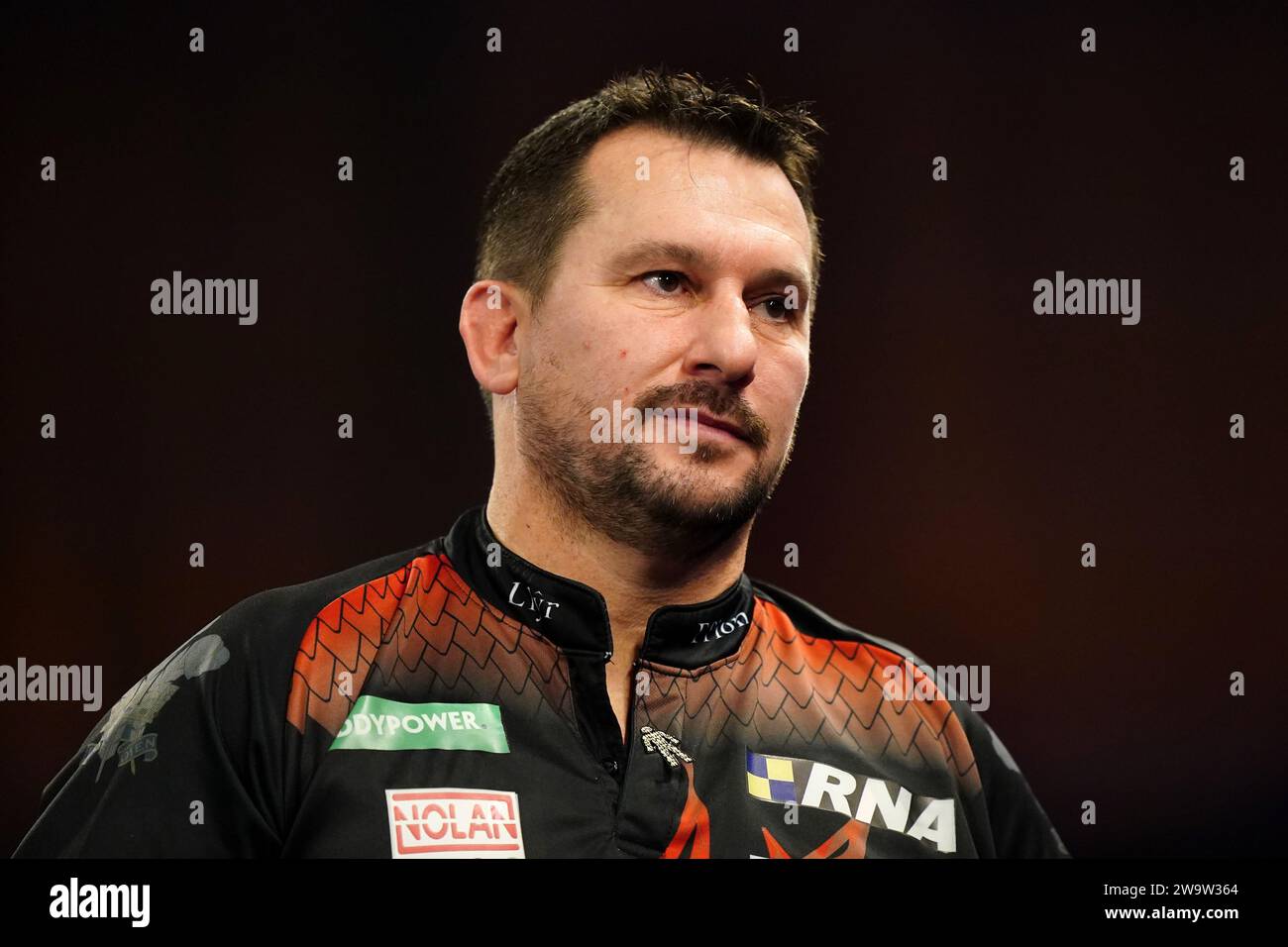 Jonny Clayton in action against Rob Cross (not pictured) on day
