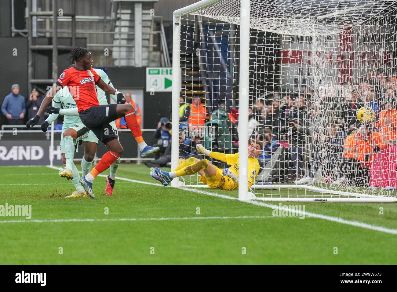 Luton, UK. 30th Dec, 2023. Elijah Adebayo (11) of Luton Town scores