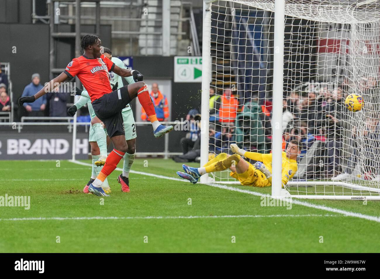 Luton, UK. 30th Dec, 2023. Elijah Adebayo (11) of Luton Town scores
