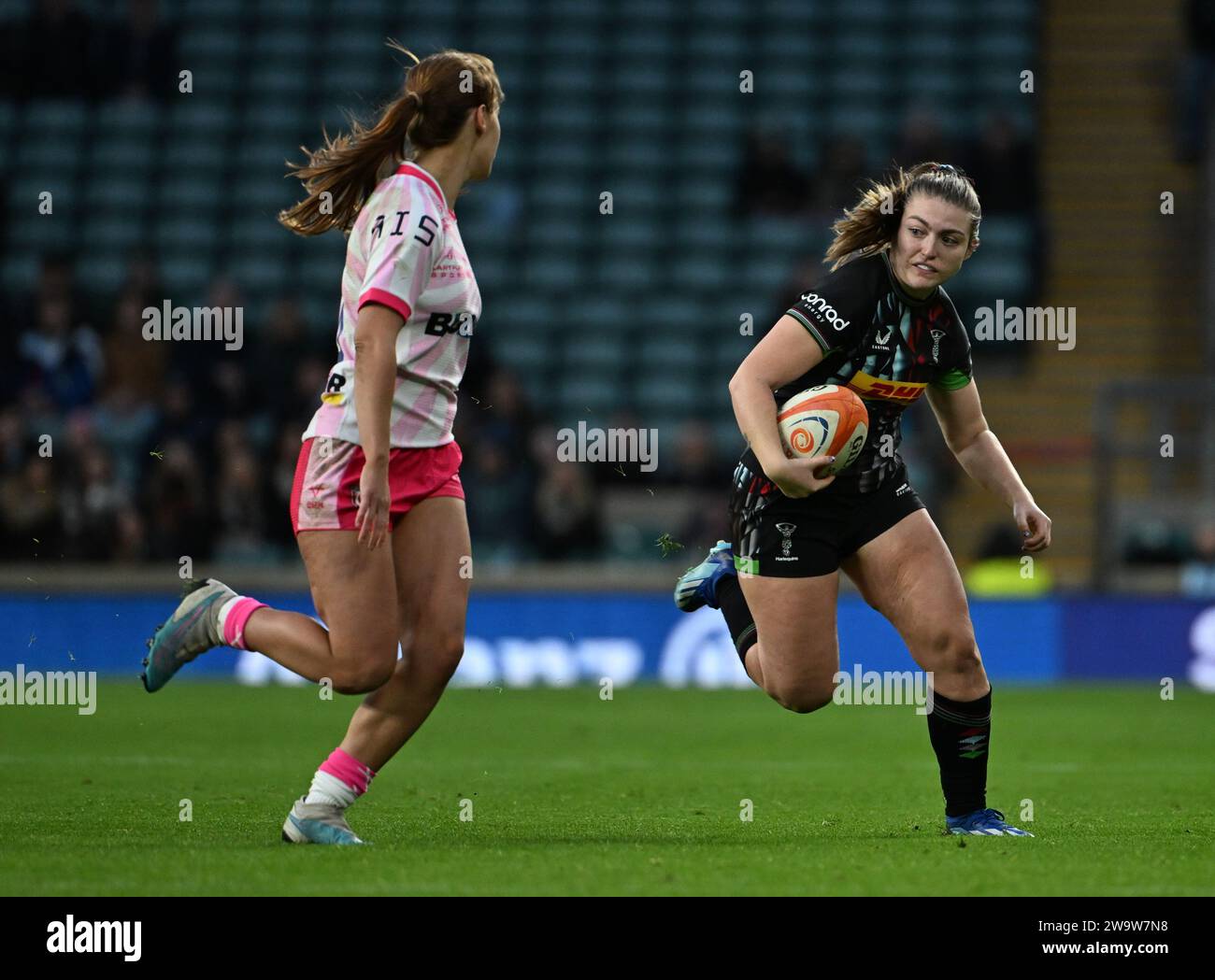 Twickenham Stadium, London, UK. 30th Dec, 2023. Premiership Womens Rugby, Harlequins versus Gloucester Hartpury; Mia Venner of Gloucester-Hartpury tracks Freya Aucken of Harlequins Credit: Action Plus Sports/Alamy Live News Stock Photo