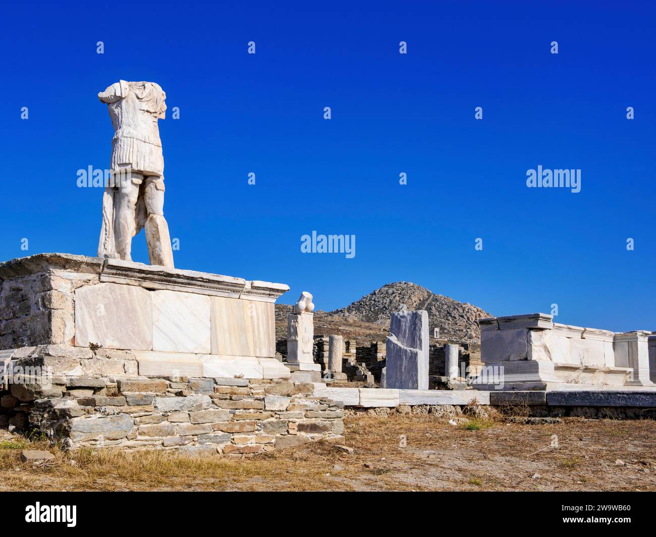 Headless Statue at the Delos Archaeological Site, Delos Island, Cyclades, Greece Stock Photo