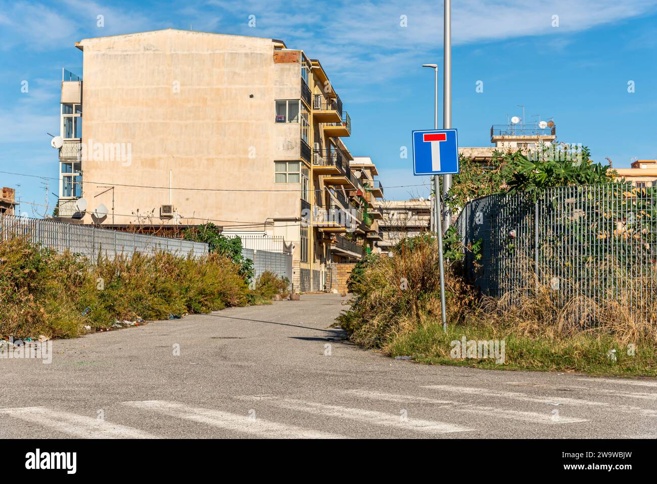 Detail of an isolated area with a dead end and related sign Stock Photo