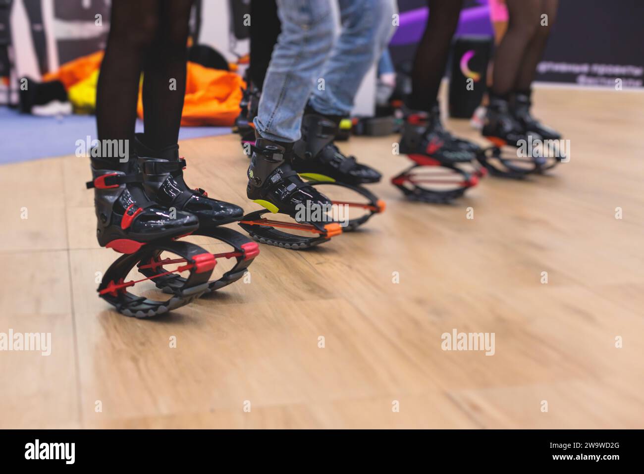 young girl exercising with kangoo shoes. sport girl in the gym training. Kangoo  jumping. Beautiful girls in Kangoo Jumping training in the gym Stock Photo  - Alamy