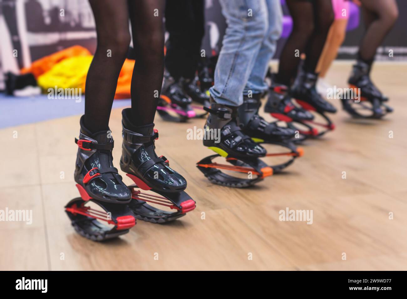 Female Trainer Doing Exercises Jumping In The Kangoo Jumps Boots Stock  Photo - Download Image Now - iStock