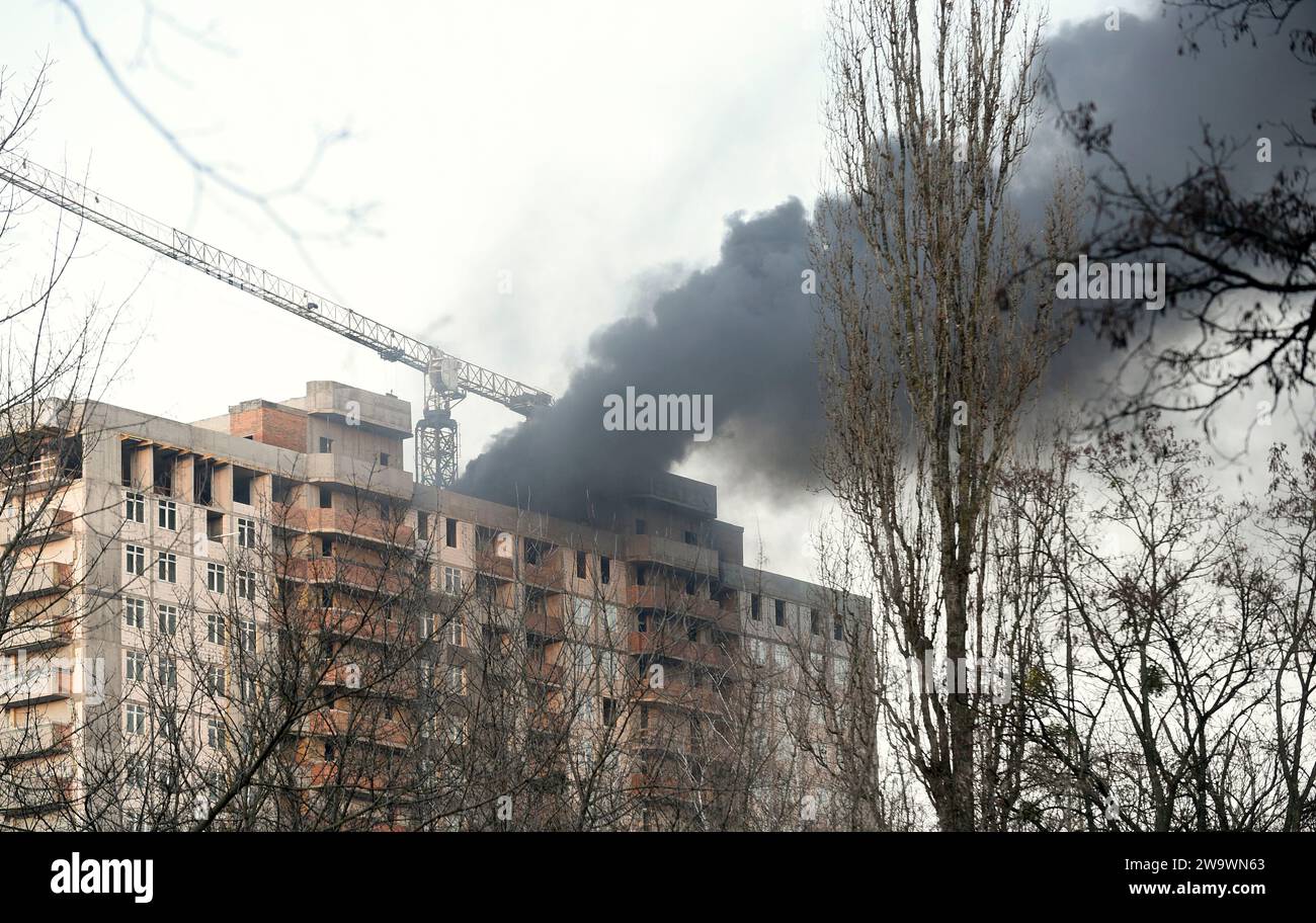 Ukraine High Rises Non Exclusive: KYIV, UKRAINE - DECEMBER 29, 2023 - Smoke rises over an ...