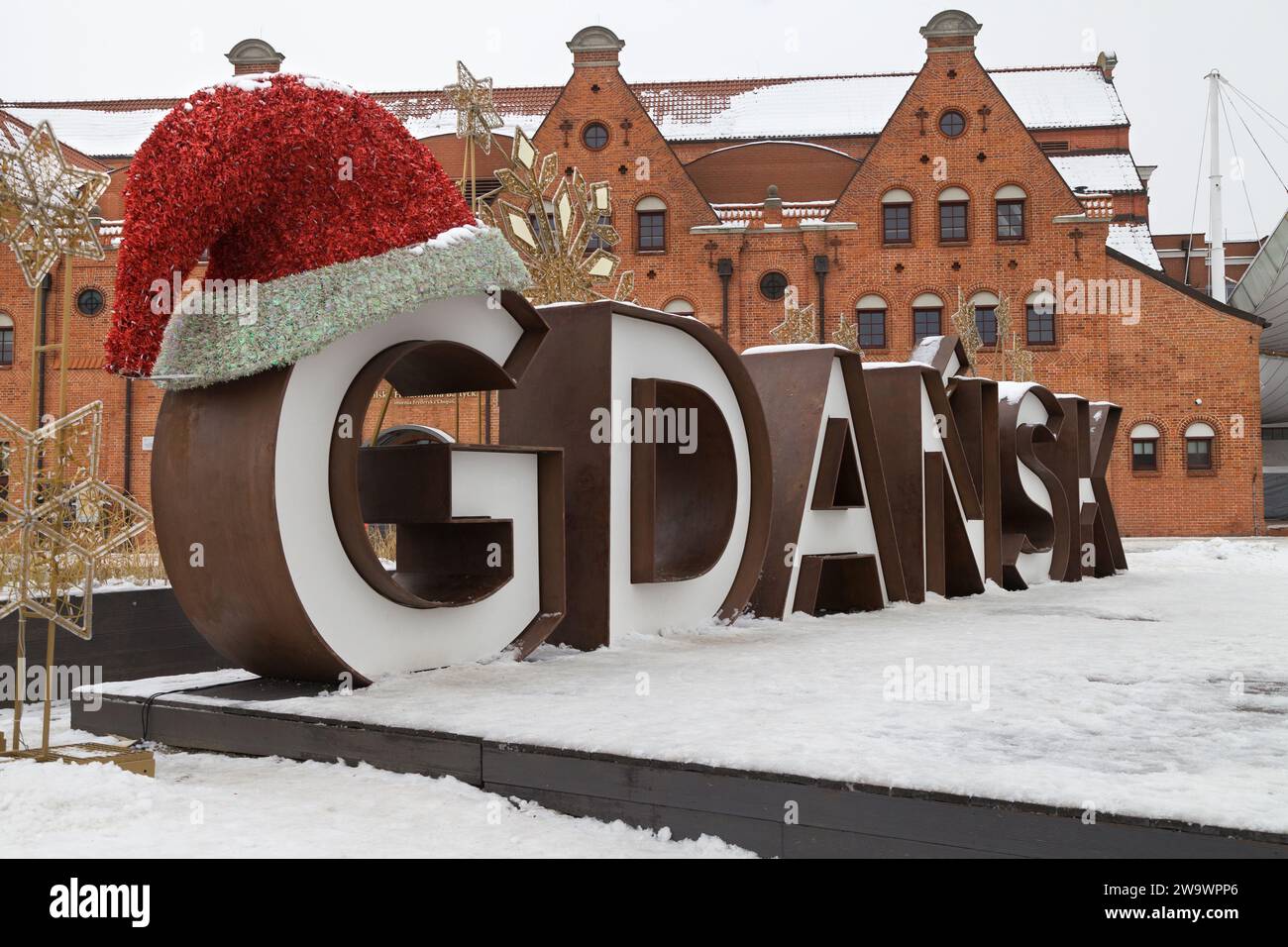 Gdansk Neon Sign in front of the Polish Baltic Frederic Chopin Philharmonic during Christmas, Gdansk, Poland. Stock Photo