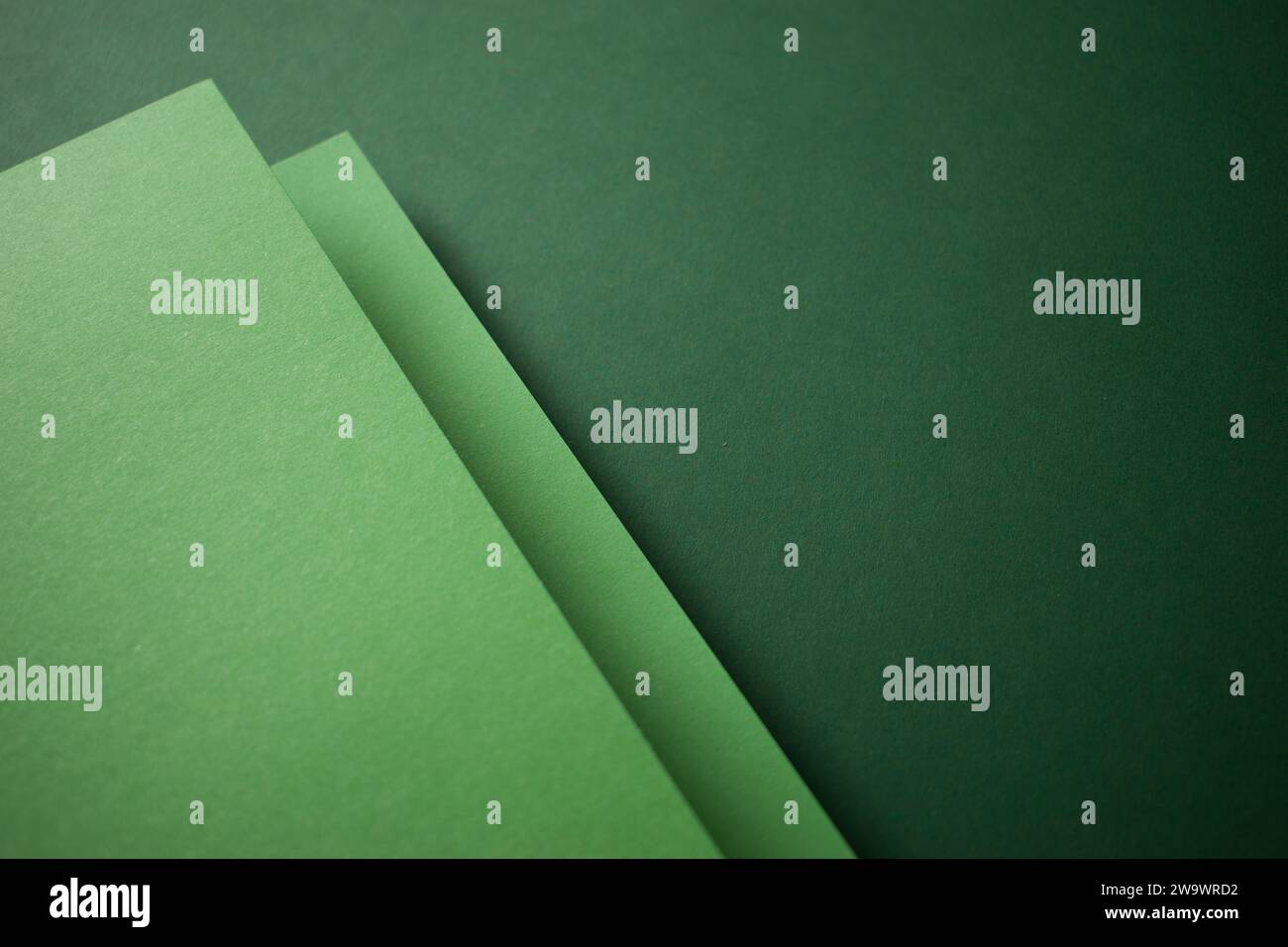 Geometric 3d two tone green background Stock Photo - Alamy