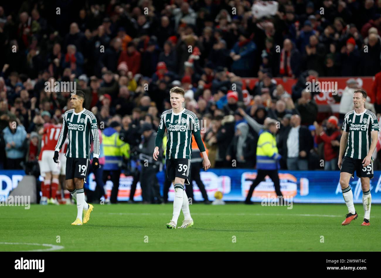 Manchester United's Raphael Varane (left), Scott McTominay (centre) and