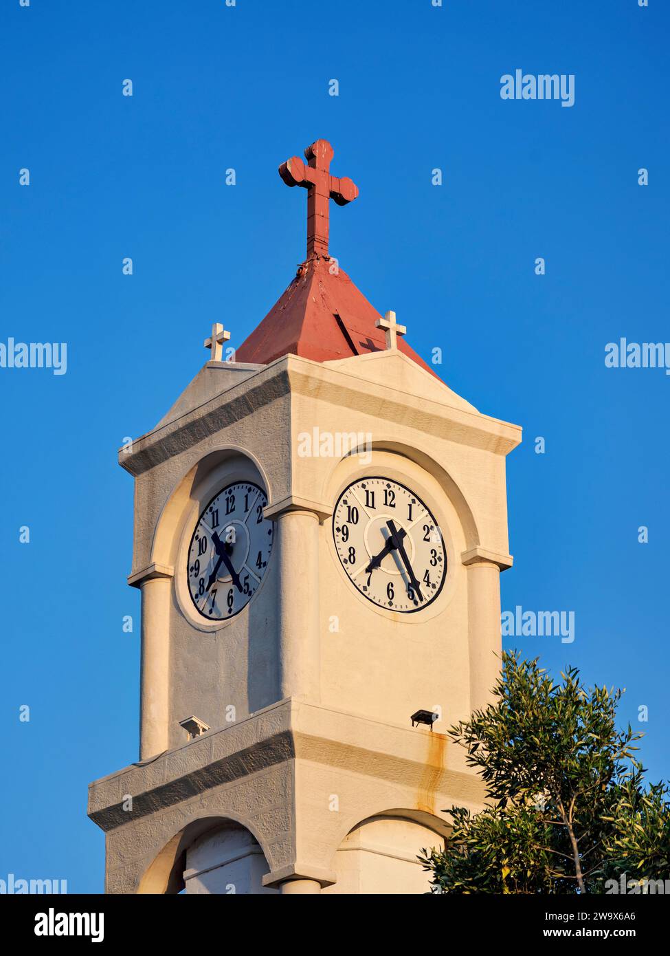 Clock Tower of the Church of the Transfiguration of Christ the Savior at the Lykourgos Logothetis Castle, Pythagoreio, Samos Island, North Aegean, Gre Stock Photo