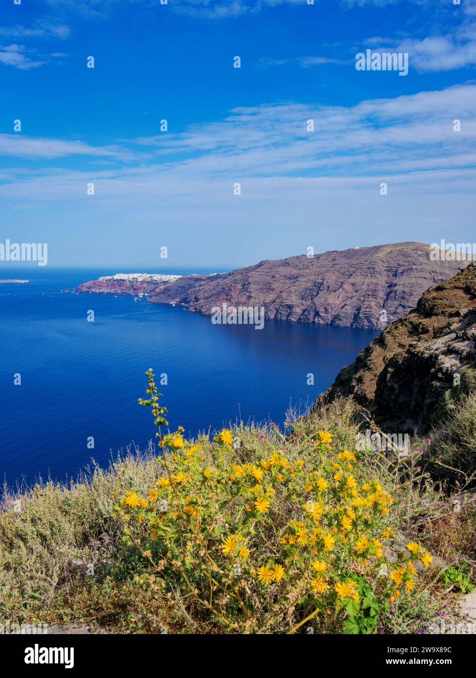 View over caldera towards the Oia Village, Santorini or Thira Island, Cyclades, Greece Stock Photo