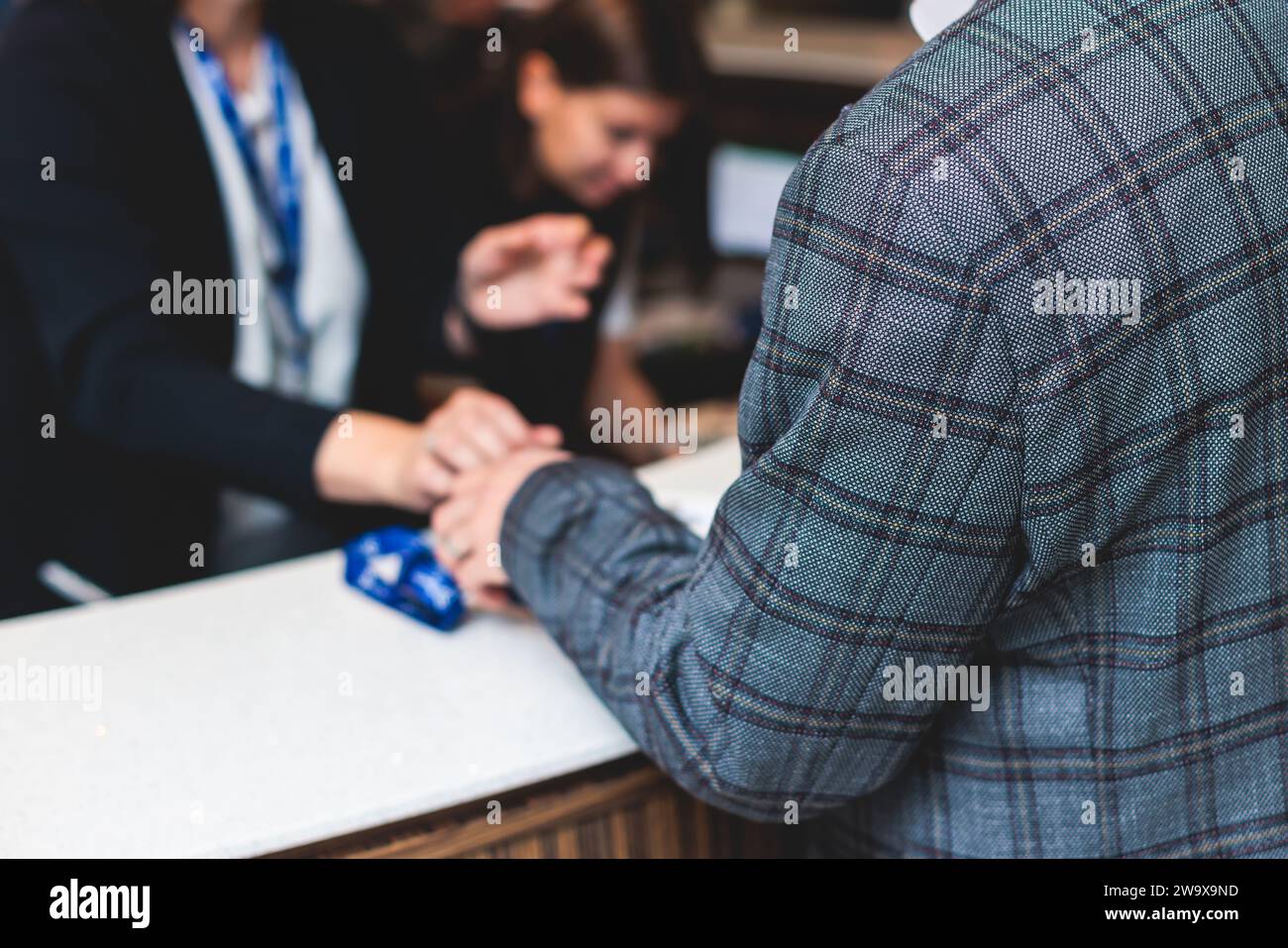 Process of checking in on a conference congress forum event ...