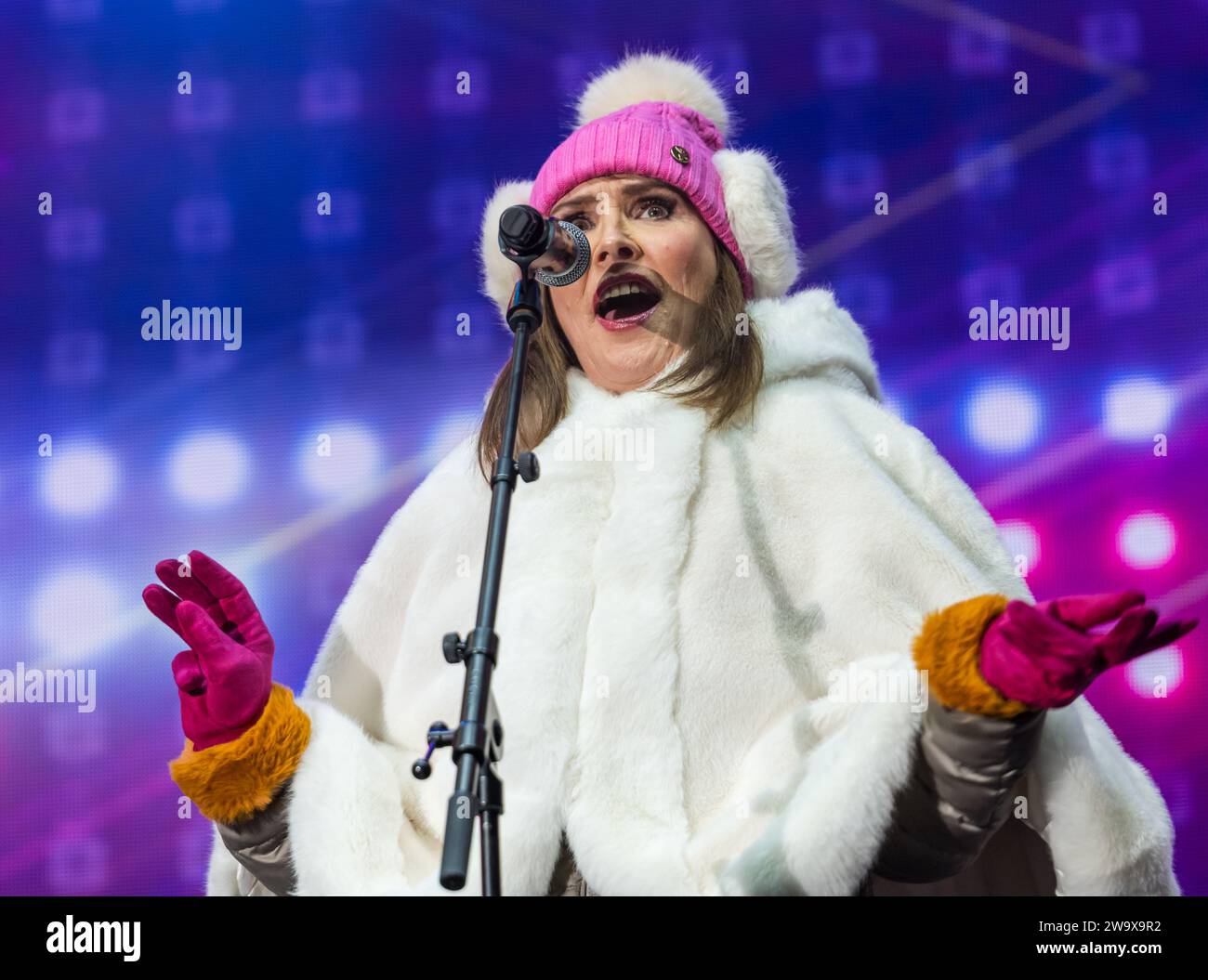 Edinburgh, Scotland, UK, 30 December 2023, Edinburgh Hogmanay: The New Year celebrations continue with the Night Afore Disco Party at Ross Bandstand with Björn Again, a musical tribute act mimicking ABBA, performing. Credit Sally Anderson/Alamy Live News Stock Photo