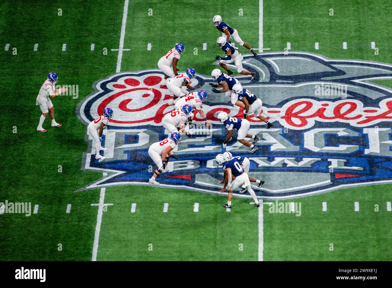Atlanta, GA, USA. 30th Dec, 2023. Mississippi lines up against Penn State in the 2023 Chickfil