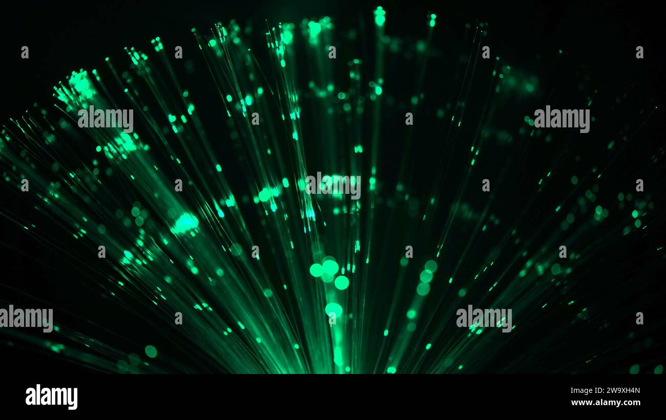 black and green abstract background of fiber optic cables Stock Photo