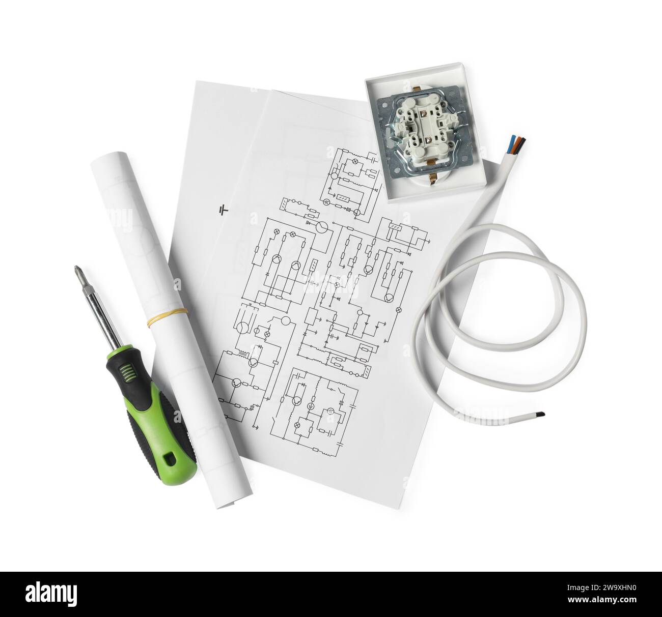 Wiring diagrams, screwdriver and disassembled light switch isolated on