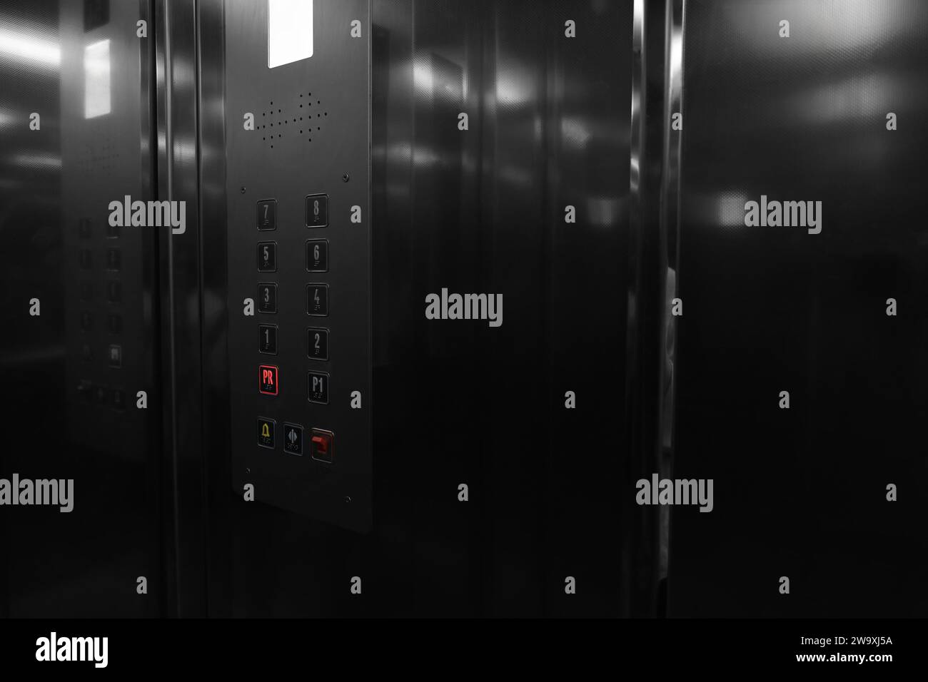 Modern metallic elevator with call button panel Stock Photo - Alamy