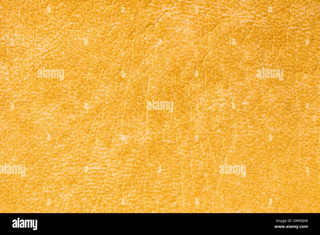 Yellow artificial leather texture background. Stock Photo
