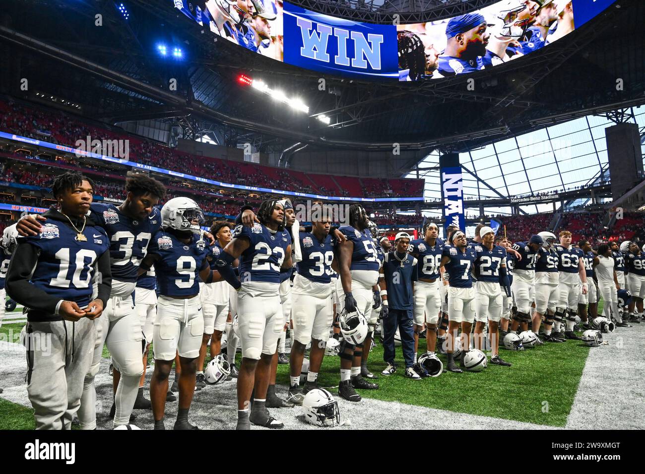 Atlanta, United States. 30th Dec, 2023. Penn State players gather to sing the school's song after the Peach Bowl against Mississippi Saturday, Dec. 30, 2023, in Atlanta, Ga. Mississippi won 38-25. Photo by David Tulis/UPI Credit: UPI/Alamy Live News Stock Photo