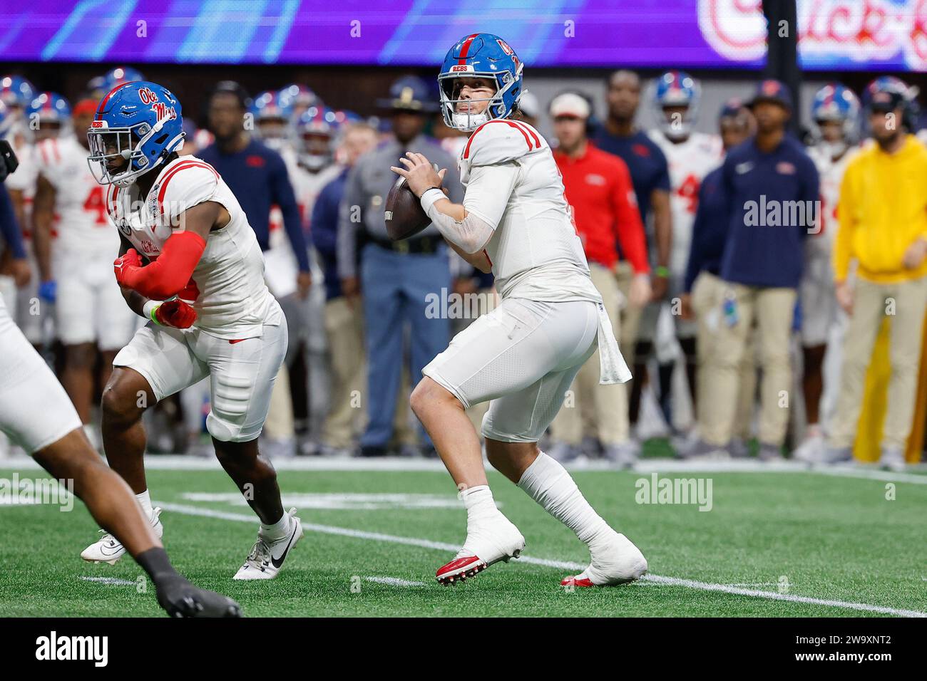 Atlanta, Georgia. 30th Dec, 2023. Jaxson Dart (2) of Ole Miss looks for ...